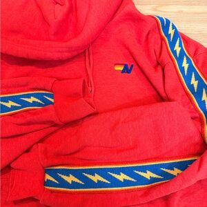 Aviator Nation Red Hoodie with Blue and Yellow Accents